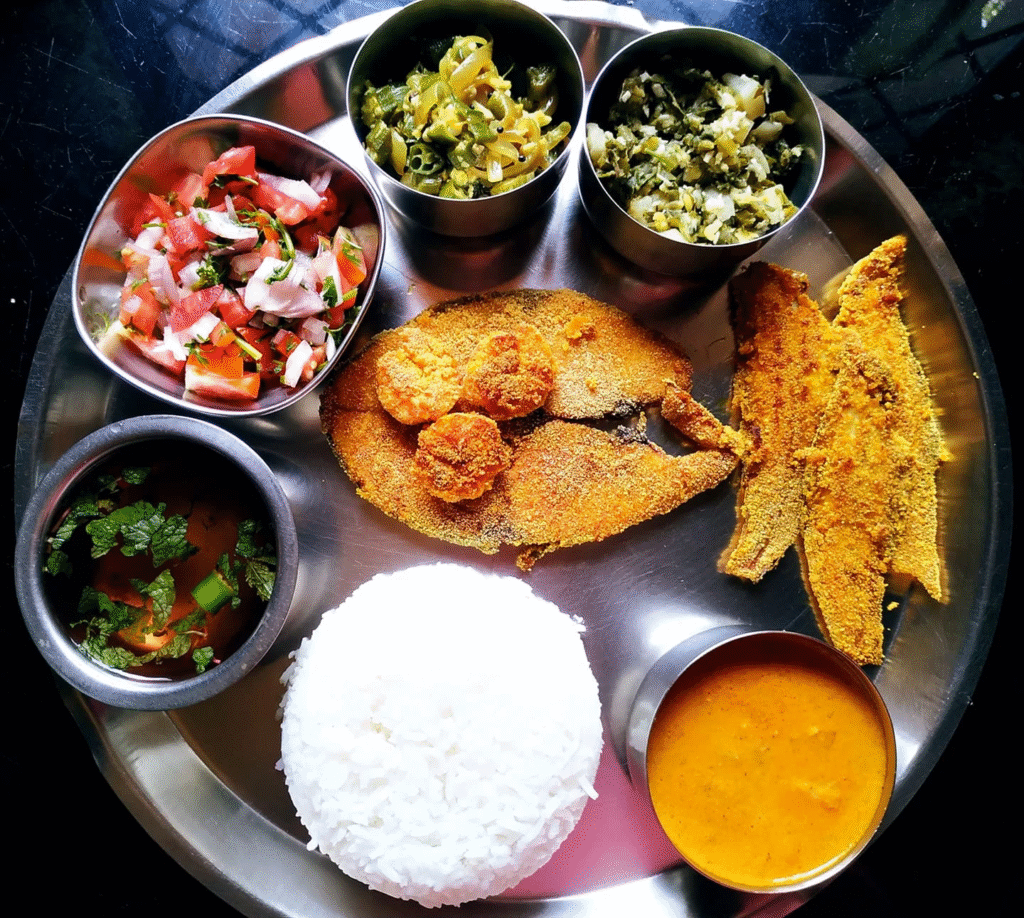 Authentic Goan seafood thali served with sol kadhi and pickles