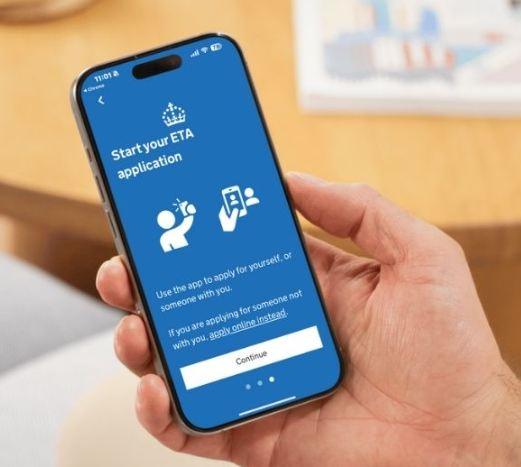 A smartphone screen displaying a digital UK Electronic Travel Authorisation (ETA) approval, a mandatory pre-travel permit for short visits to the United Kingdom.
